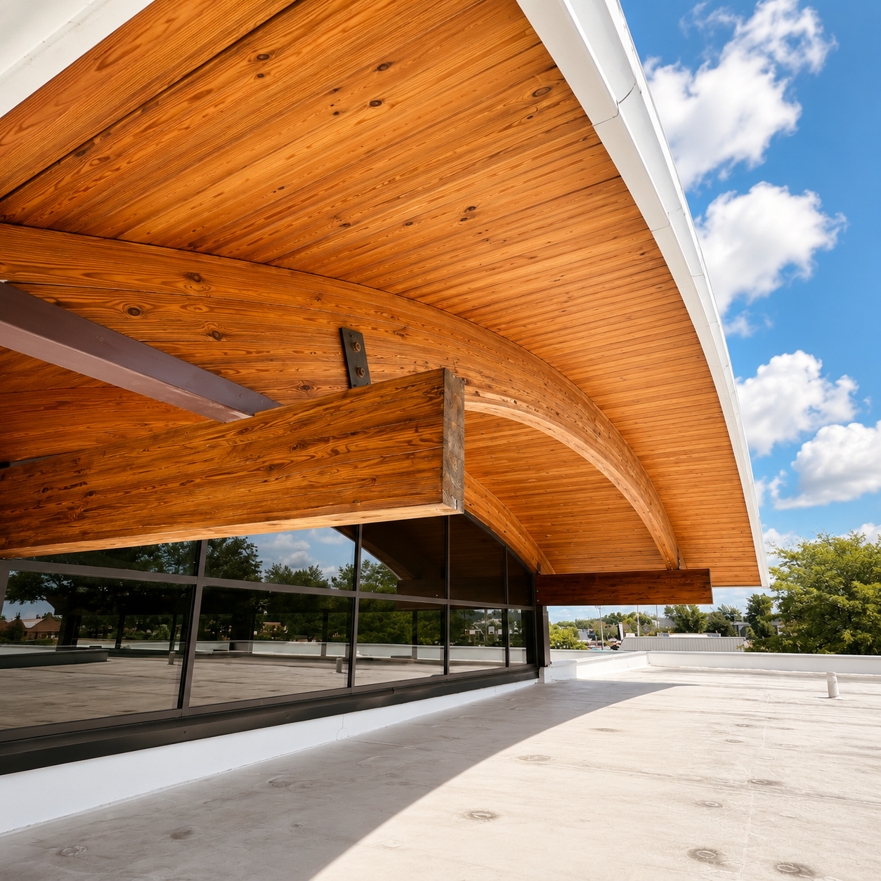 Commercial rooftop terrace with a stained cedar curved canopy
